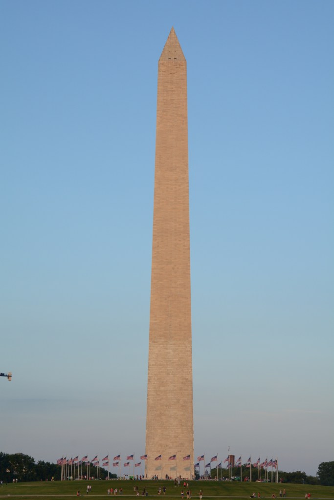 The Washington Monument - surrounded by the stars and stripes
